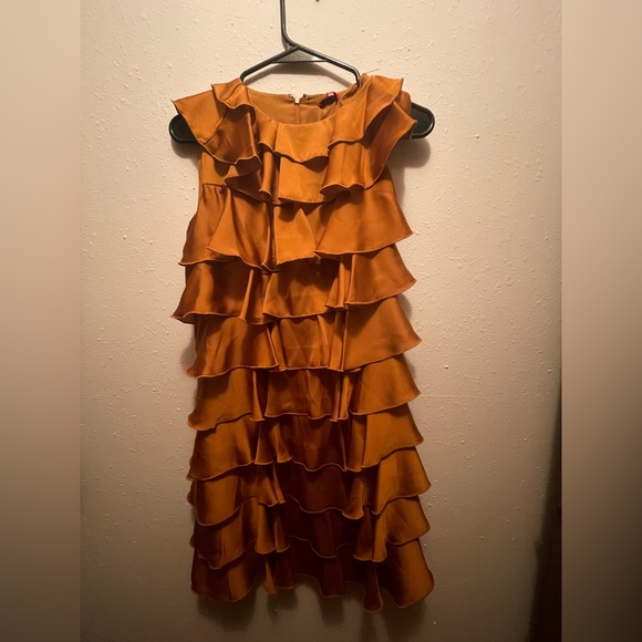 Ruffled, silky rust color dress. Size small. Never worn. NWT. Make an offer. - Picture 1 of 2